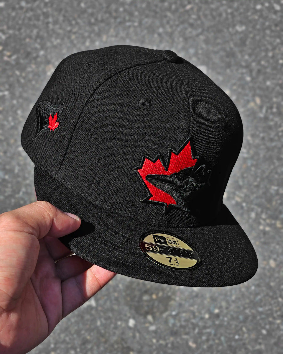 TORONTO BLUE JAYS NEGRO BLACKOUT VISOR ROJO